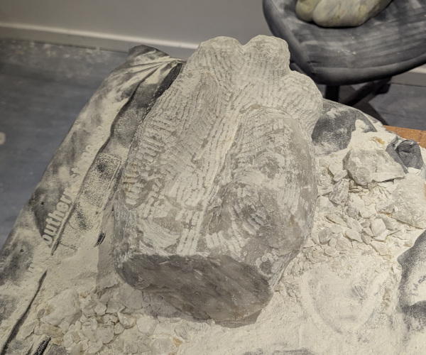 a sculpture depicting a hand